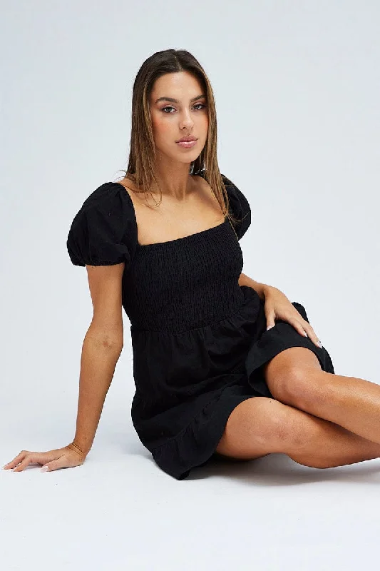 Ethereal bohemian mini dress-Black Fit and Flare Dress Short Sleeve Shirred