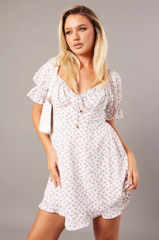 Trendy mini dress-White Floral Fit And Flare Dress Puff Sleeve